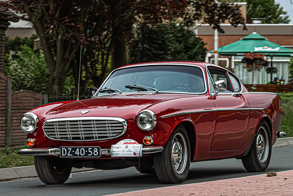 Cyan again dominates with a gorgeous Volvo P1800 restomod